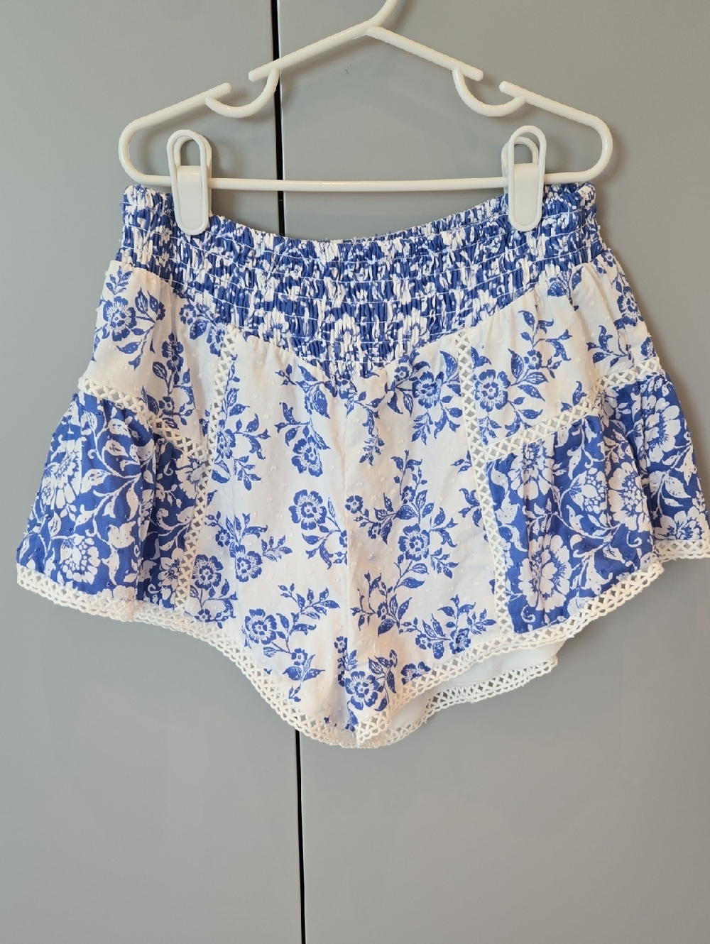 Altar'd State White and Blue Floral Smocked High-Waist Shorts